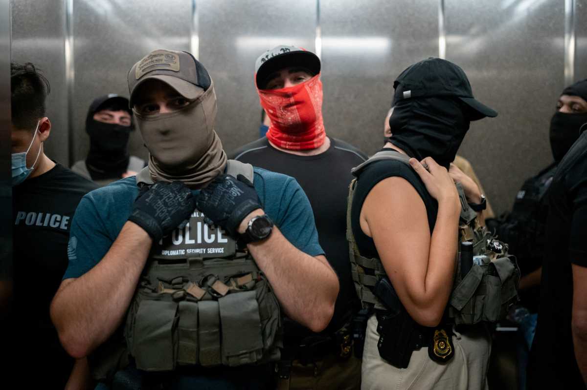 RepBenWaxman's tweet card. A group of Democratic state representatives intend to introduce legislation banning law enforcement from wearing masks and nondescript clothing, as federal