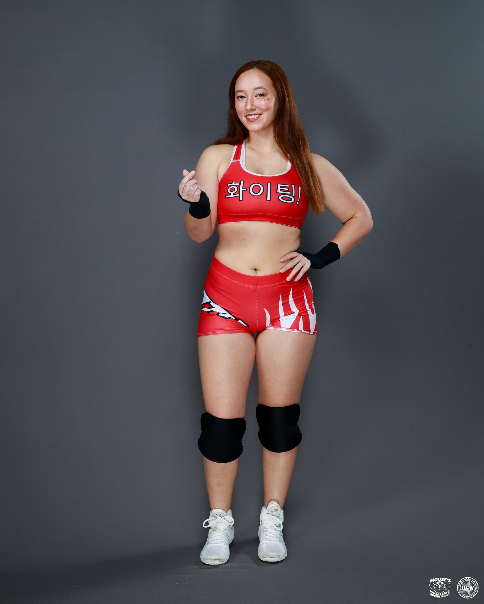jazzywangyang's tweet card. Signed 9 by 6 picture of Jazzy in red gear