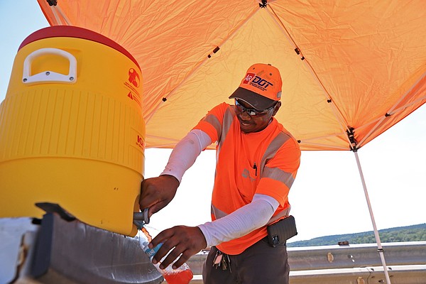 UB_HEAT_Lab's tweet card. While many Arkansans shelter indoors from the heat, many workers with contractors and the Arkansas Department of Transportation are out on state roadways doing necessary work.