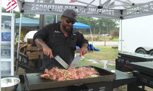 KXAN_News's tweet card. As early as 9:30 a.m., you’ll find Arturo Ramon standing over a grill at the Center Point Fire Department.