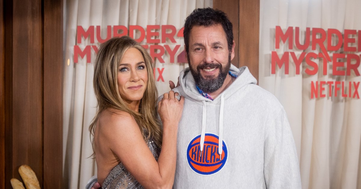 usweekly's tweet card. Adam Sandler was asked about longtime friend Jennifer Aniston's relationship with hypnotist Jim Curtis after their Mallorca vacation