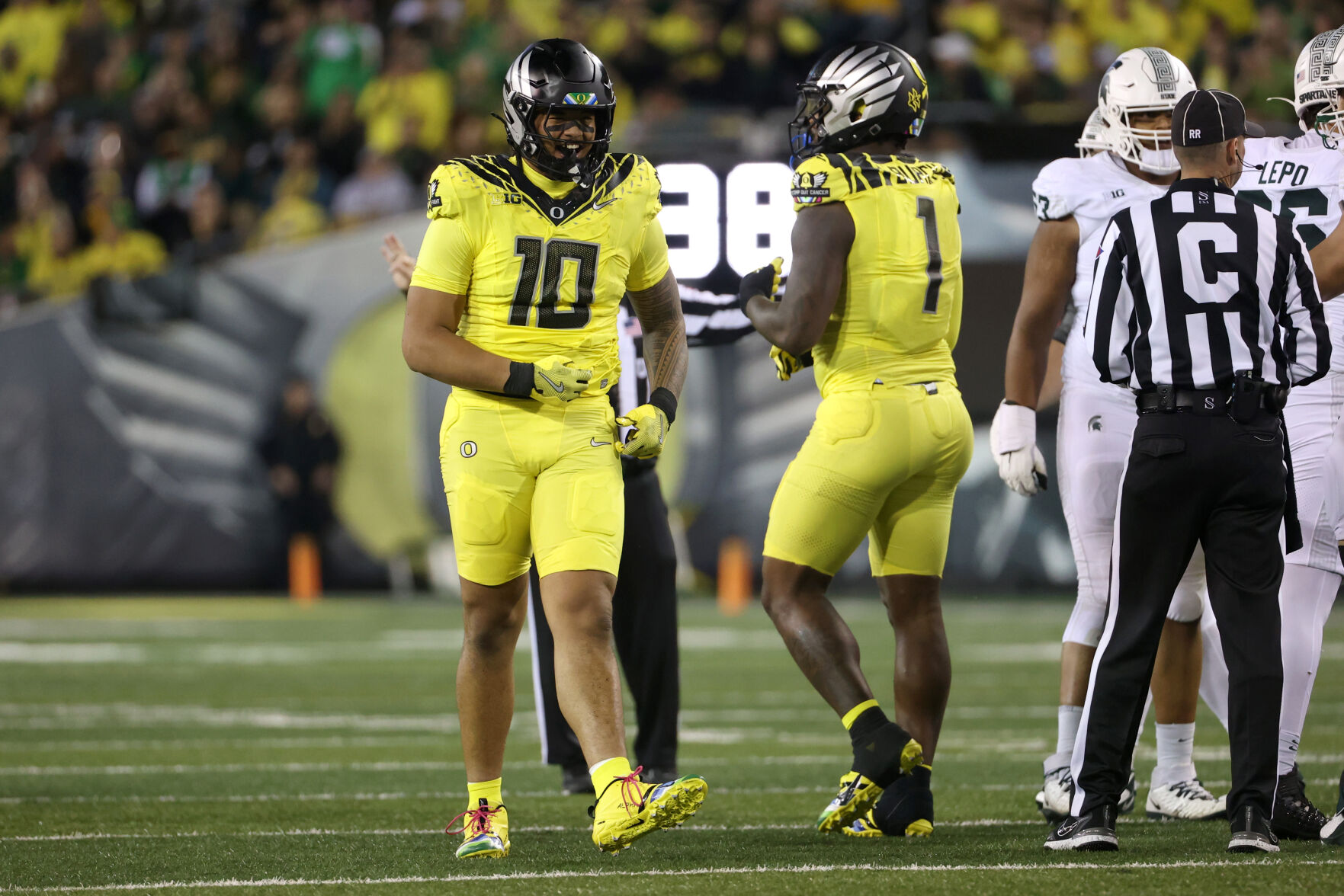 SpartansAlerts's tweet card. Two Oregon football players, Matayo Uiagalelei and Dillon Thieneman, earned a place on the Big Ten's 2025 preseason honors list Tuesday