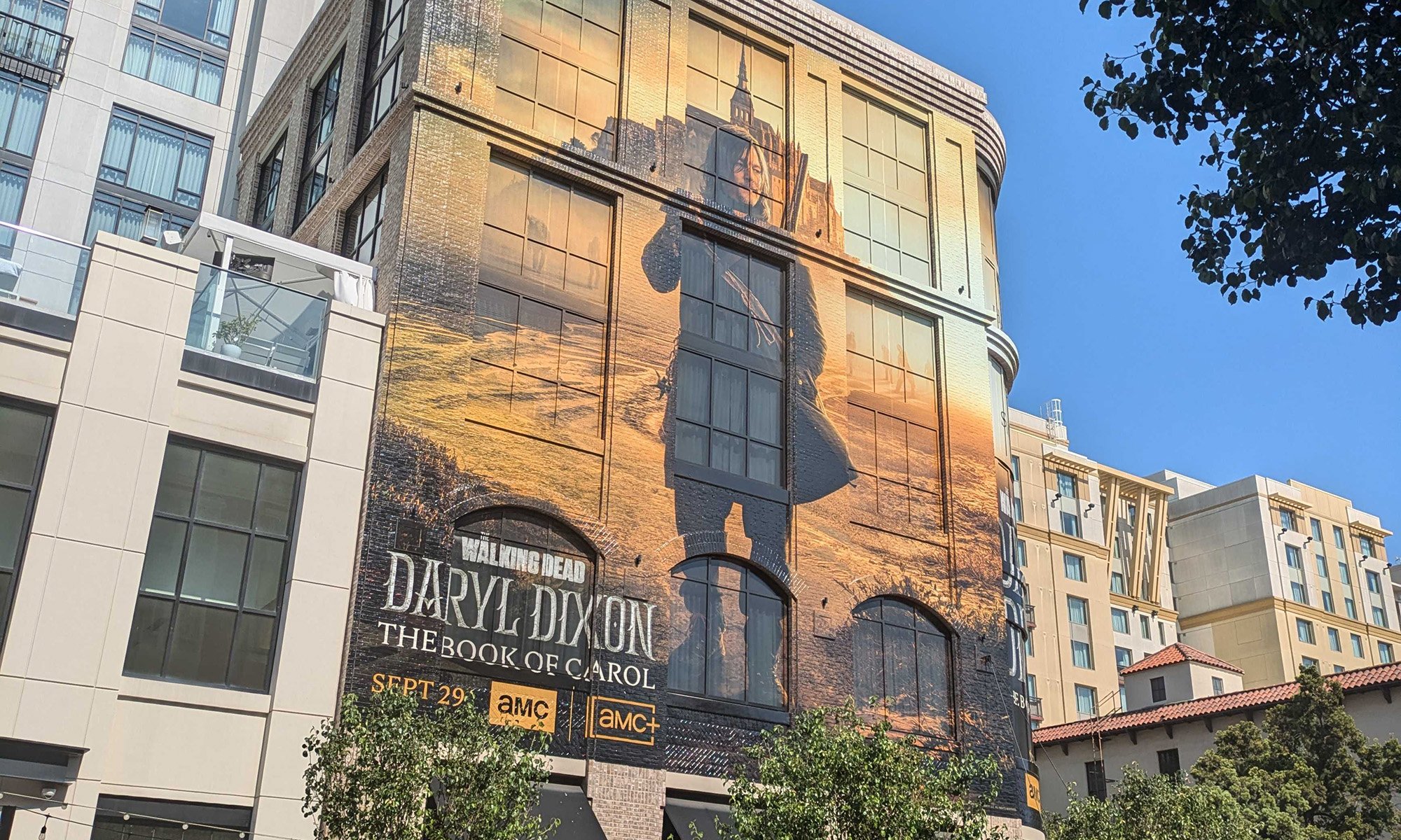 PopverseSays's tweet card. San Diego Comic-Con's Hotel bulding wraps cost over $100k each, which makes the fact they're technically illegal only a small nuisance.
