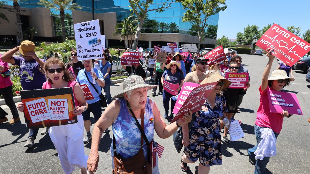 LATSeema's tweet card. Protestors railed on Tuesday against an Orange County congresswoman who could be a critical vote on President Trump’s proposal to cut more than $1 trillion in federal dollars that helped pay for...