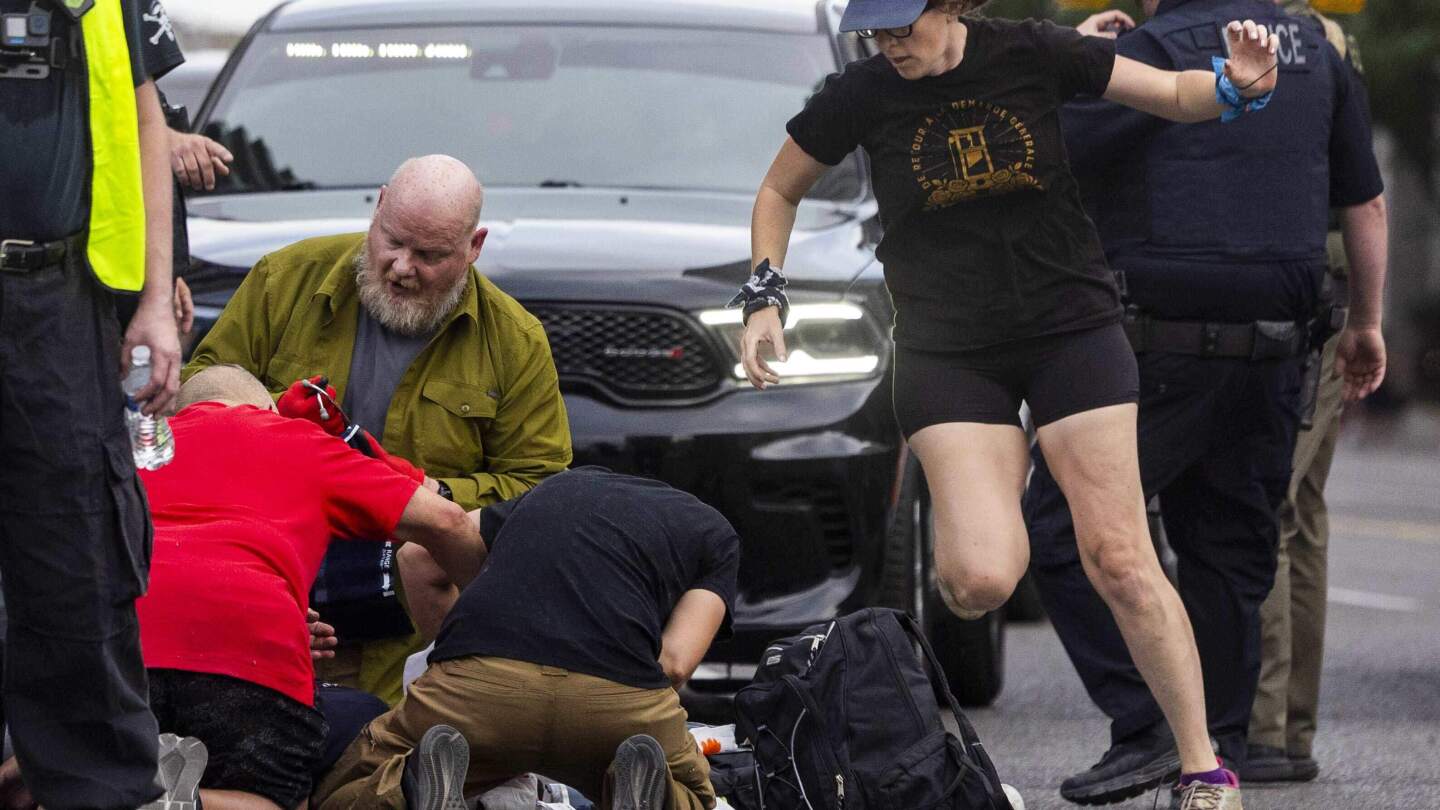 H_Schoenbaum's tweet card. The “No Kings” protest in Salt Lake City was struck by violence when a man allegedly brandished a rifle near the crowd.