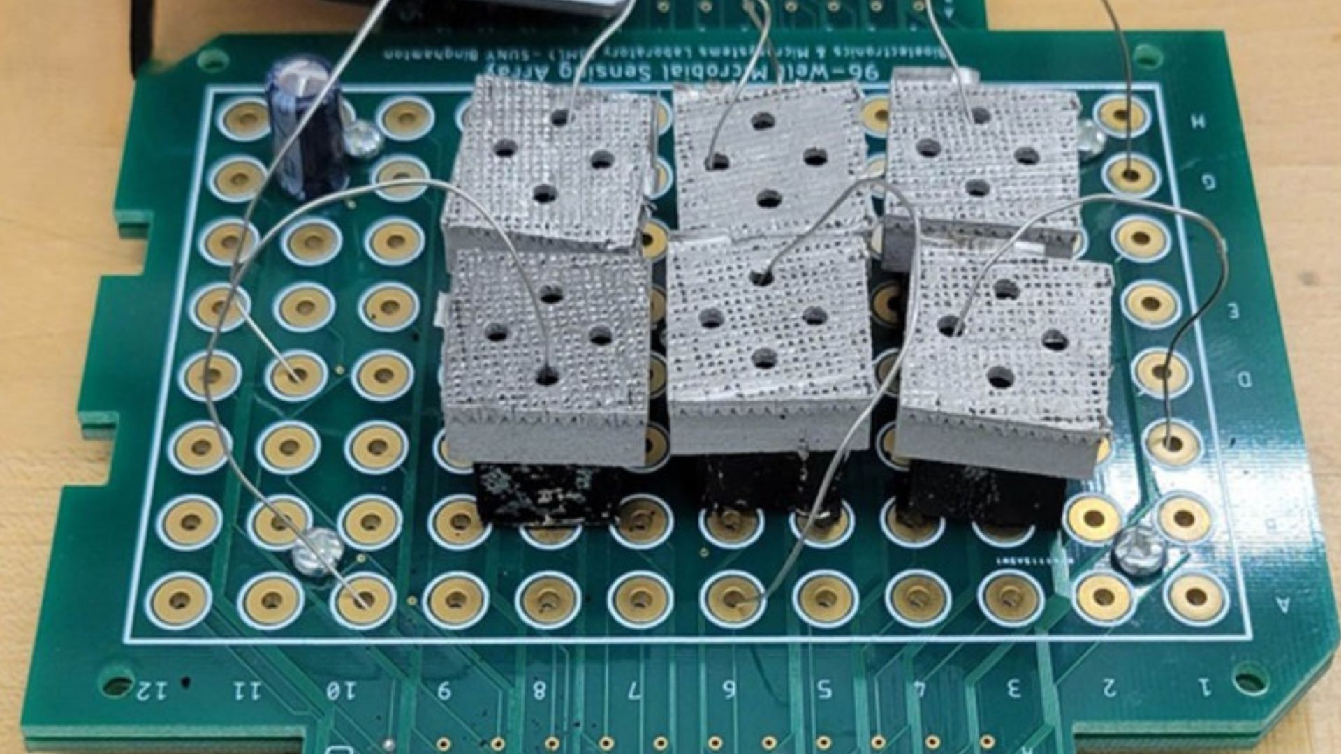 PhilipG11218771's tweet card. Binghamton researchers 3D printed steel biobatteries powered by spores, reaching record-high output for small electronics.