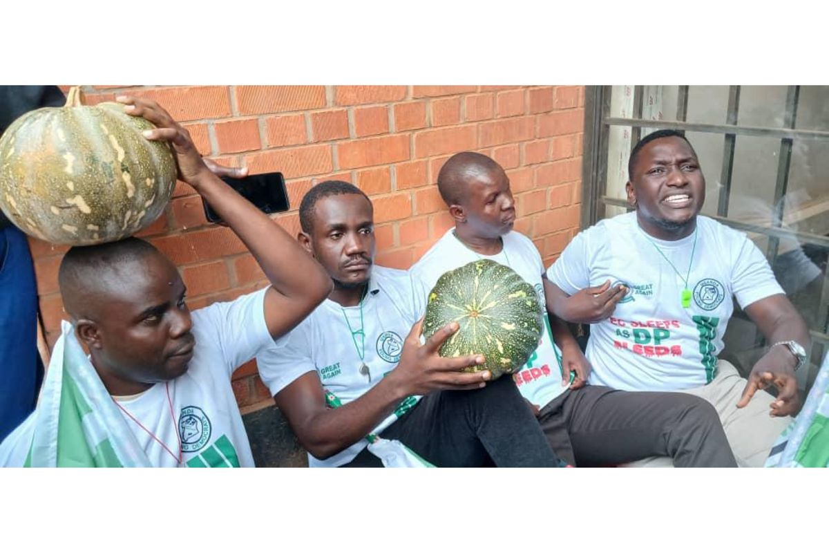 DailyMonitor's tweet card. The group, led by Michael Mpunge, a former contestant in the disputed elections, carried pumpkins and mats as symbols of protest