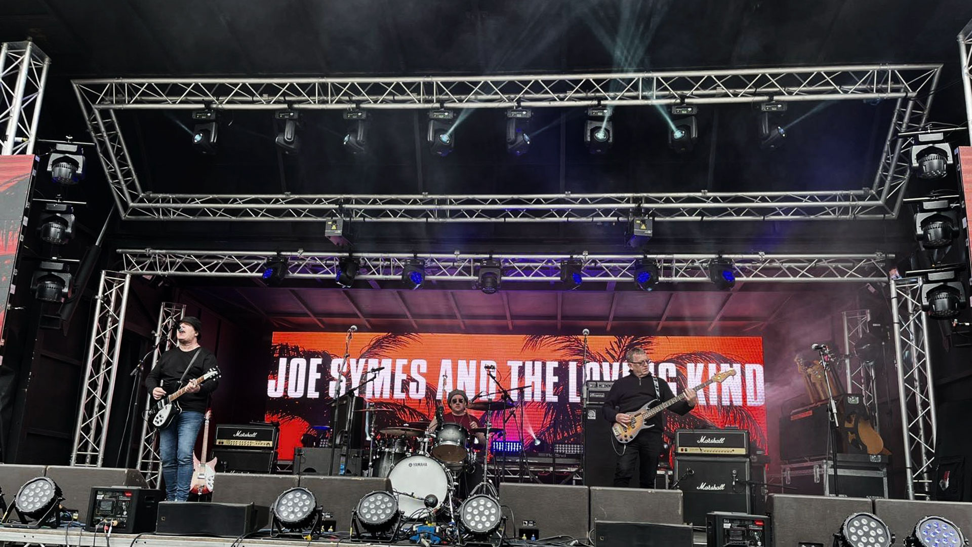 ColinW83's tweet card. Joe Symes and the Loving Kind have been around for a minute now. They've long ago established themselves, their style, and their sound in the annals of indie,