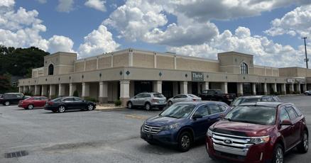 PCGreenville's tweet card. Brett Swanson, operator of Laurens Road Chick-Fil-A, plans to expand the drive-thru. He will renovate the strip mall at East Antrim Drive to make room.