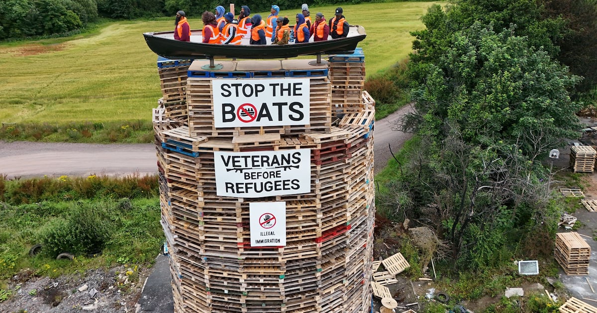 ConnlaYoung's tweet card. Hate-filled display appears on loyalist bonfire
