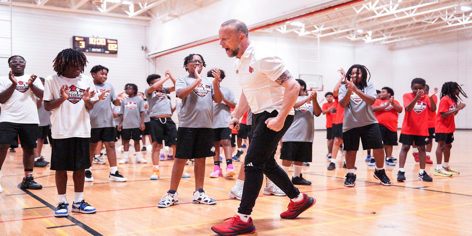 CardsHQ_CJ's tweet card. U of L hoops is in Year 3 of partnering with Connor Kids Academy. Ryan Conwell: "It's a blessing, to be able to have the opportunity to give back."
