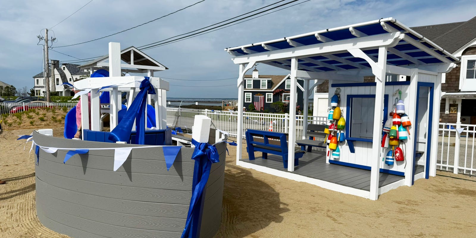 seacoastonline's tweet card. The new playground includes a lighthouse, lobster shack playhouse, rope walk, monkey bar rings, climbing tower with slides, and a swing set.