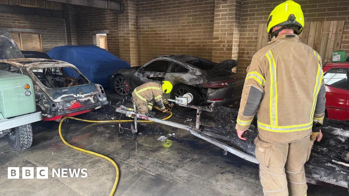 DrHindmarsh's tweet card. Fire crews save some vehicles, but a boat is also lost in the flames.