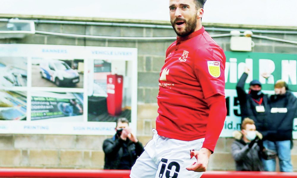 NonLeaguePaper's tweet card. Aaron Wildig spent the best years of his career at Morecambe and is heartbroken to see the chaos currently engulfing the Shrimps.