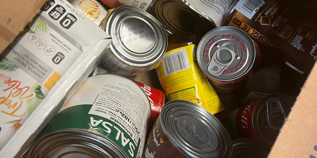 SanAngeloLIVE's tweet card. San Angelo Food Bank hosting drive-thru distribution July 26 at San Angelo Stadium — registration required.