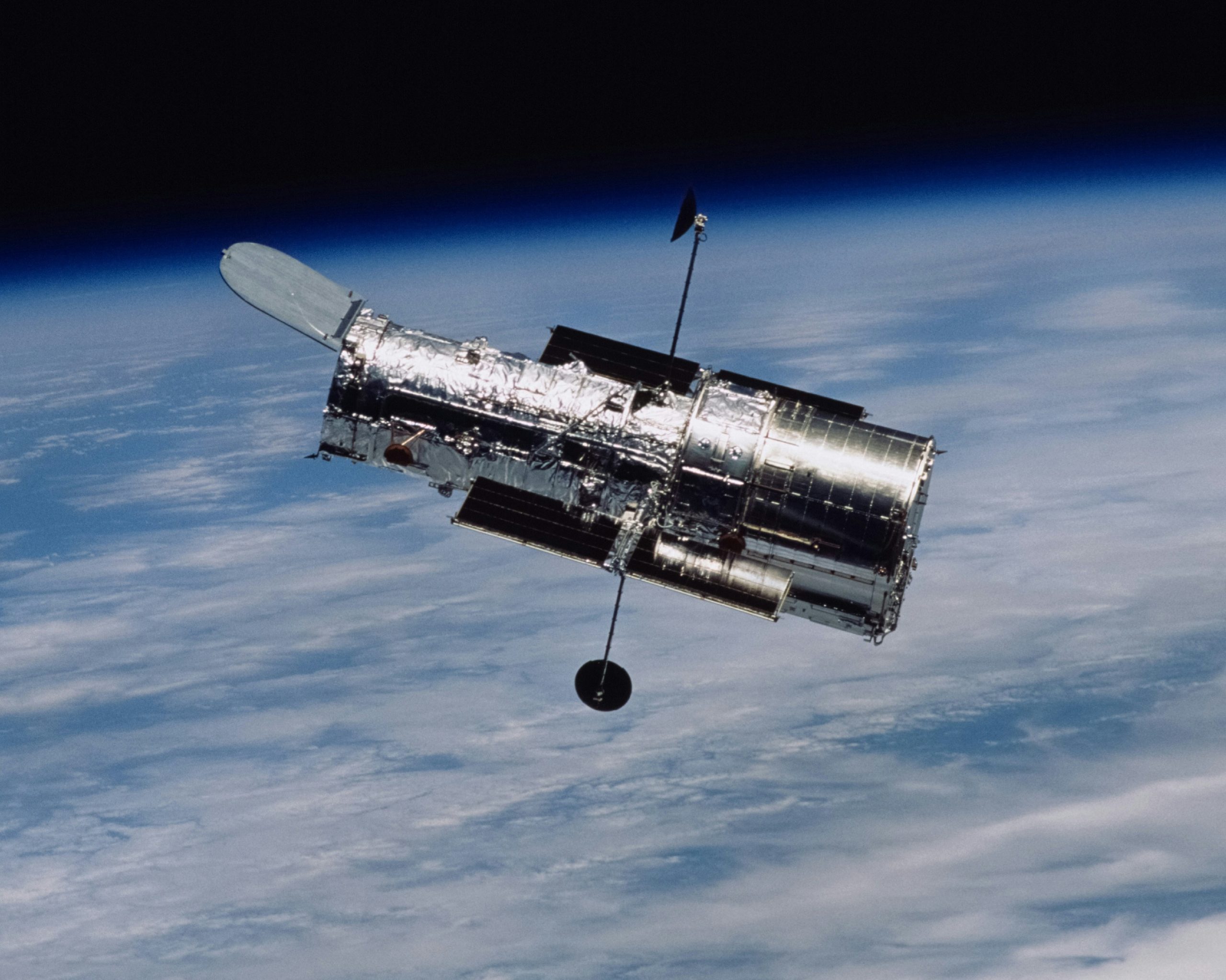 SWHeritage's tweet card. A recent talk by Director Roberto Di Cosmo highlights how 10 years in, Software Heritage aims its 'large telescope' at the future of code.