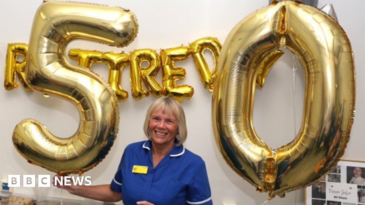 EmmaJThomas's tweet card. Julie Thomas has worked in the NHS for 50 years, with 38 years spent as a school nurse.