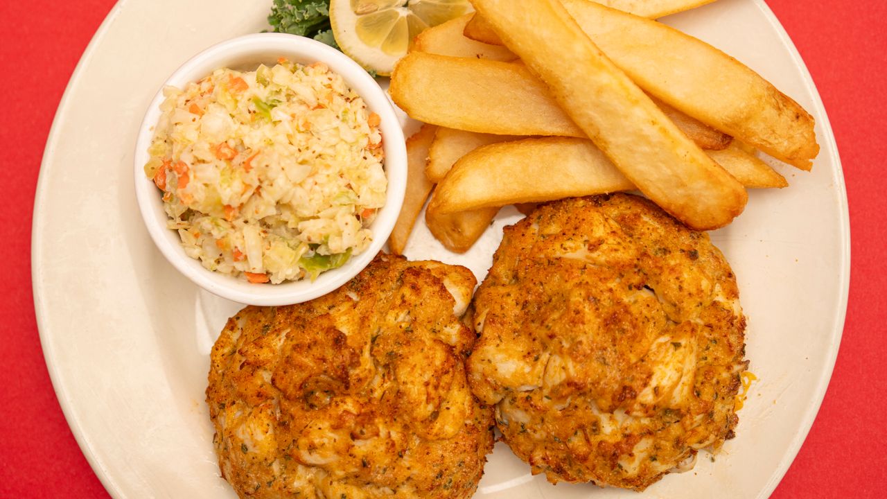 senatorbulworth's tweet card. Summer means blue crab season in Baltimore, which locals celebrate with generously packed crab cakes. These are the best versions.