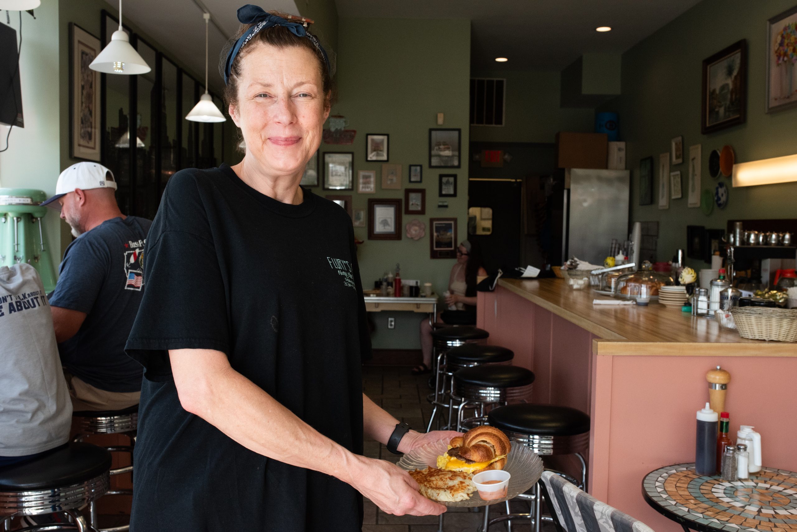 SignalAkron's tweet card. Taste This: Flury's Cafe owner Kimberly White uses croissants baked by Sally Thompson of Summit Croissants.