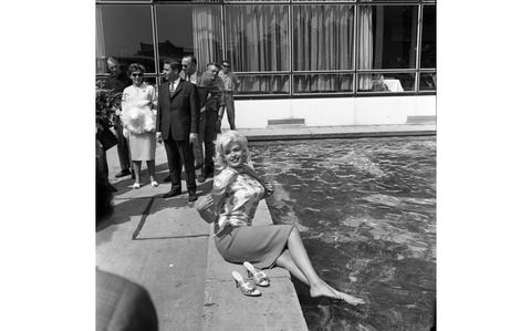 starsandstripes's tweet card. Keeping cool by the pool, 1961