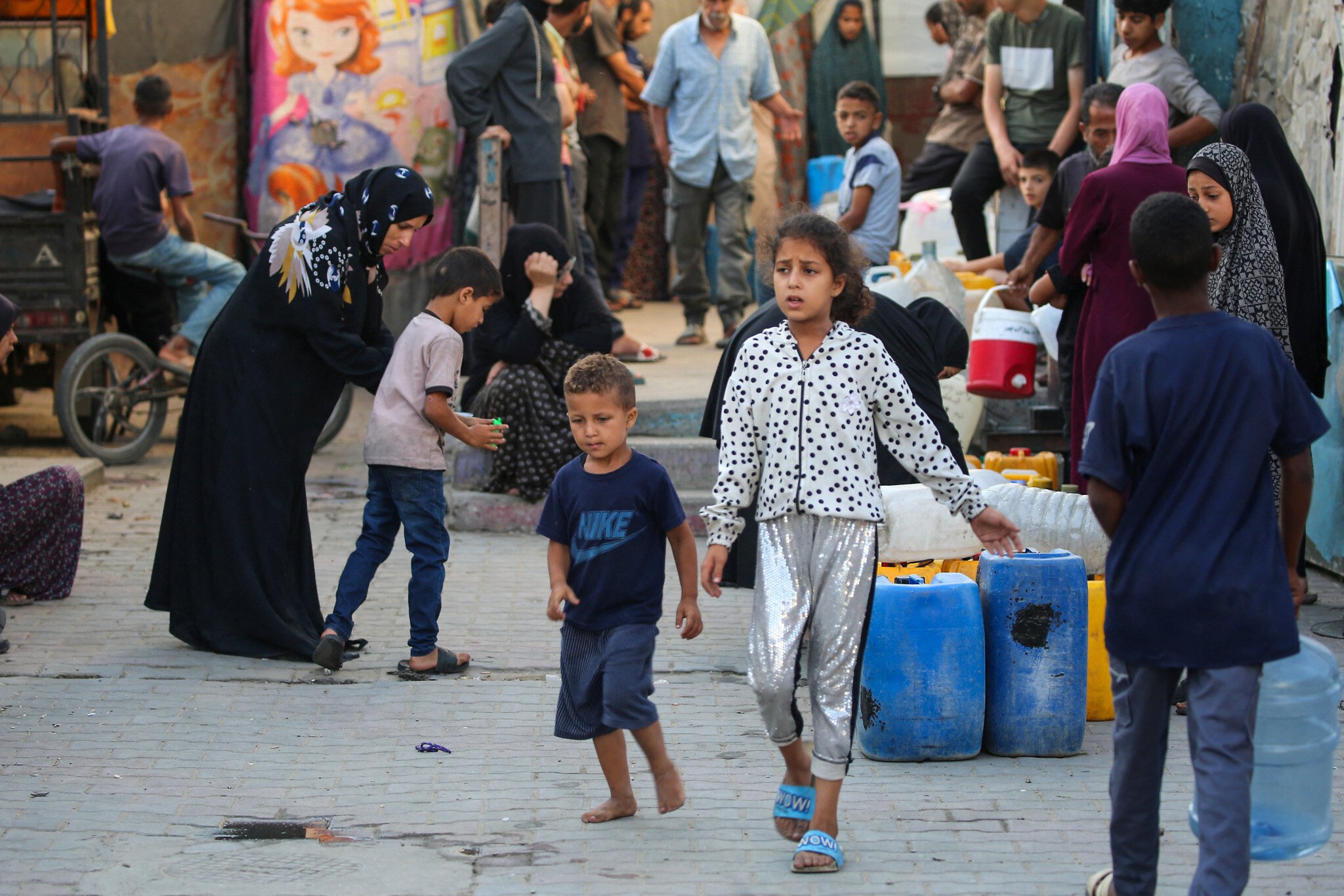 joerglau's tweet card. Israel rejects joint demand, US envoy slams it; FMs from UK, Canada, EU say Israel-backed aid scheme dangerous, 'deprives Gazans of human dignity'; condemn 'humanitarian city' plan