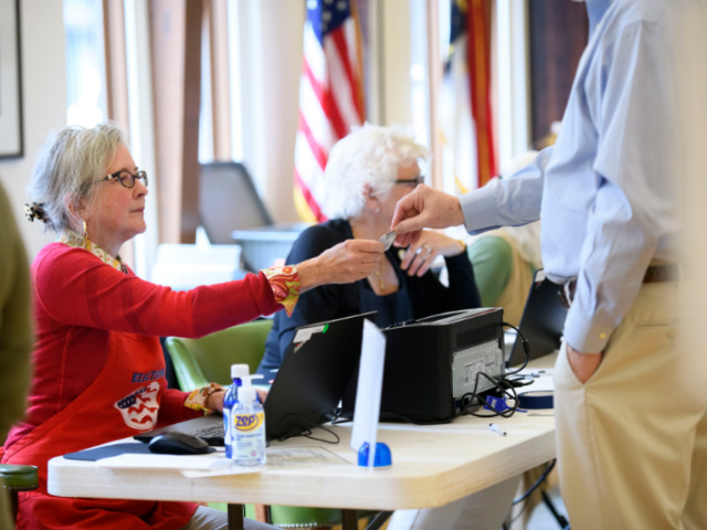 TopNewsbyCPAC's tweet card. A federal judge dismissed a lawsuit brought by Hillary Clinton attorney Marc Elias against Wyoming's voter ID and residency law.