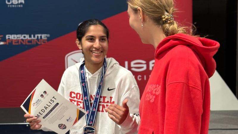 CornellSports's tweet card. MILWAUKEE, Wis. – Two Cornell University women's fencing athletes brought home hardware from the US Summer Nationals held at the Baird Center in Milwaukee, Wisconsin this week.