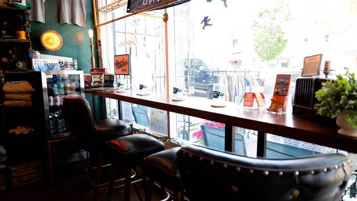 thenewstribune's tweet card. The store features “outdoor casual” clothing brands and a place to sit and sip while you shop.