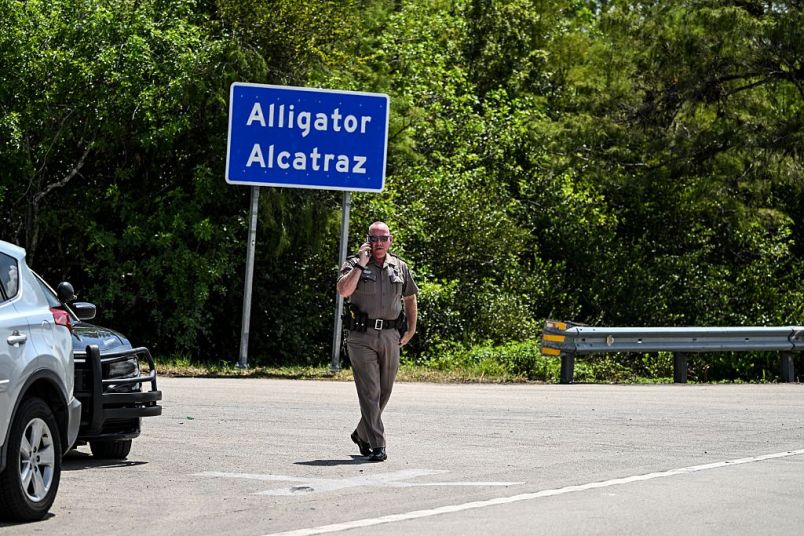 TPM's tweet card. Citing conditions and legal issues at Governor Ron DeSantis’ “Alligator Alcatraz” facility...