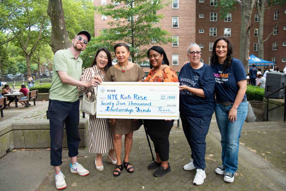 QNS's tweet card. The Woodside Houses Residents Association welcomed a $25,000 scholarship donation from energy company Rise Light & Power at its fourth annual Family Day