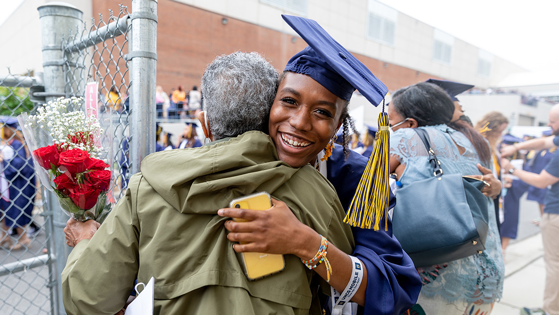 uncghhs's tweet card. Higher education circles call it social mobility, but graduates and their families can best explain the impact of a degree and how UNCG makes their lives better and North Carolina communities...