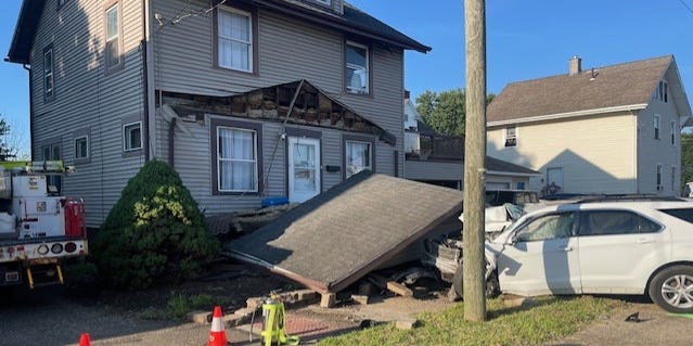 CantonRepdotcom's tweet card. A Canton house partially collapsed after being hit by an SUV that drove into the front porch.