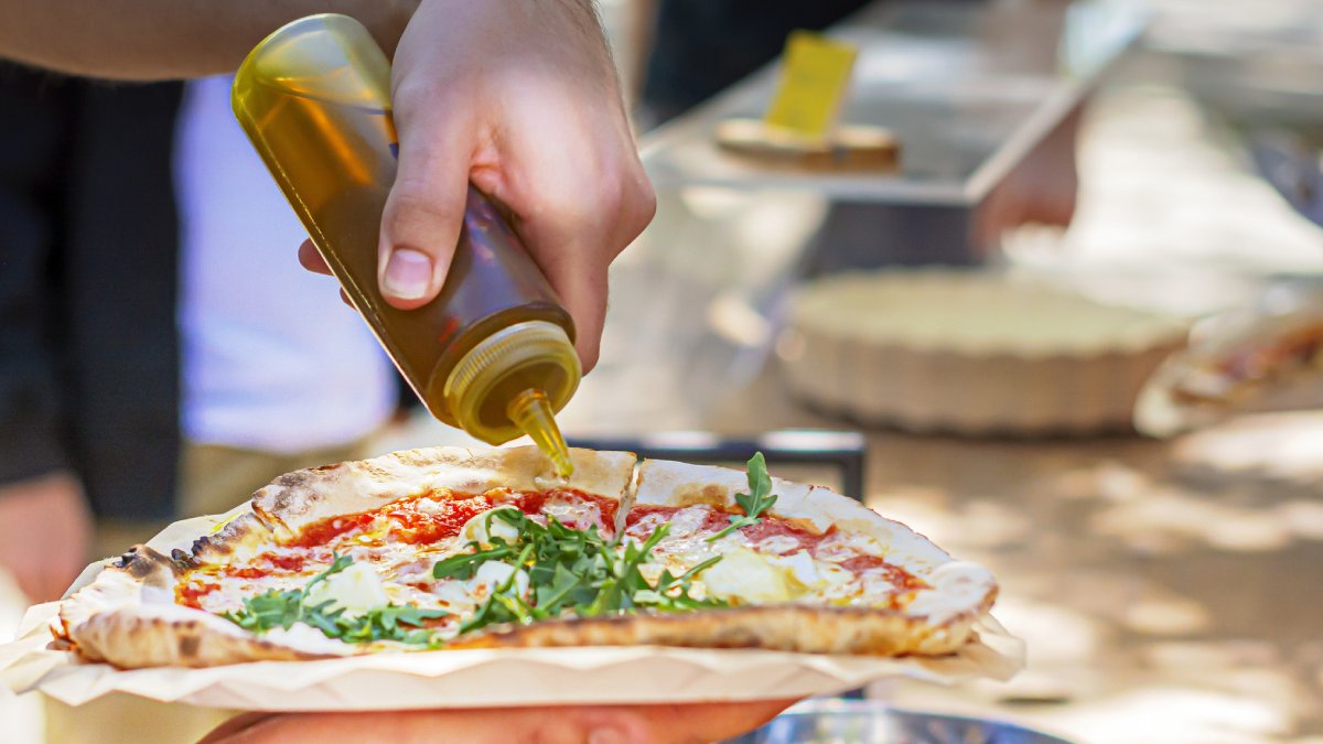 EMPoisonPharmD's tweet card. This report describes THC intoxication among patrons at a Wisconsin restaurant that was later linked to mislabeled THC-infused oil used to prepare food in a kitchen shared with a vendor licensed to se