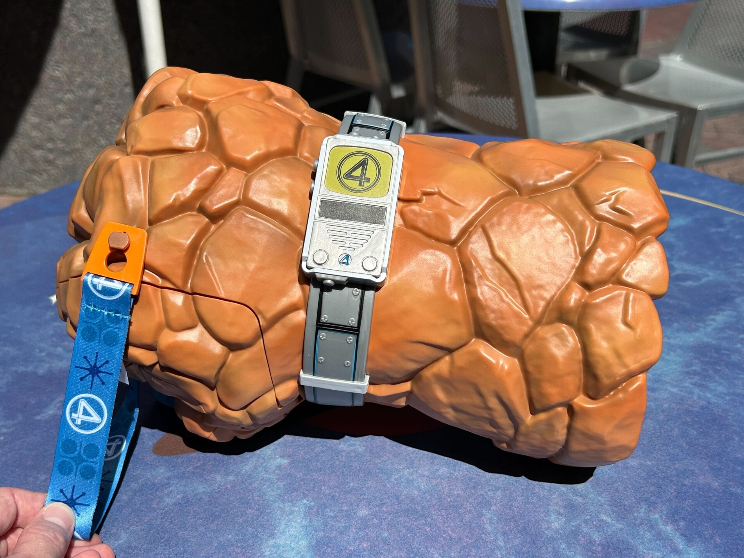dlnt's tweet card. The Thing Sipper and Mr. Fantastic Straw Clip inspired by The Fantastic Four: First Steps are now available at Disneyland Resort.
