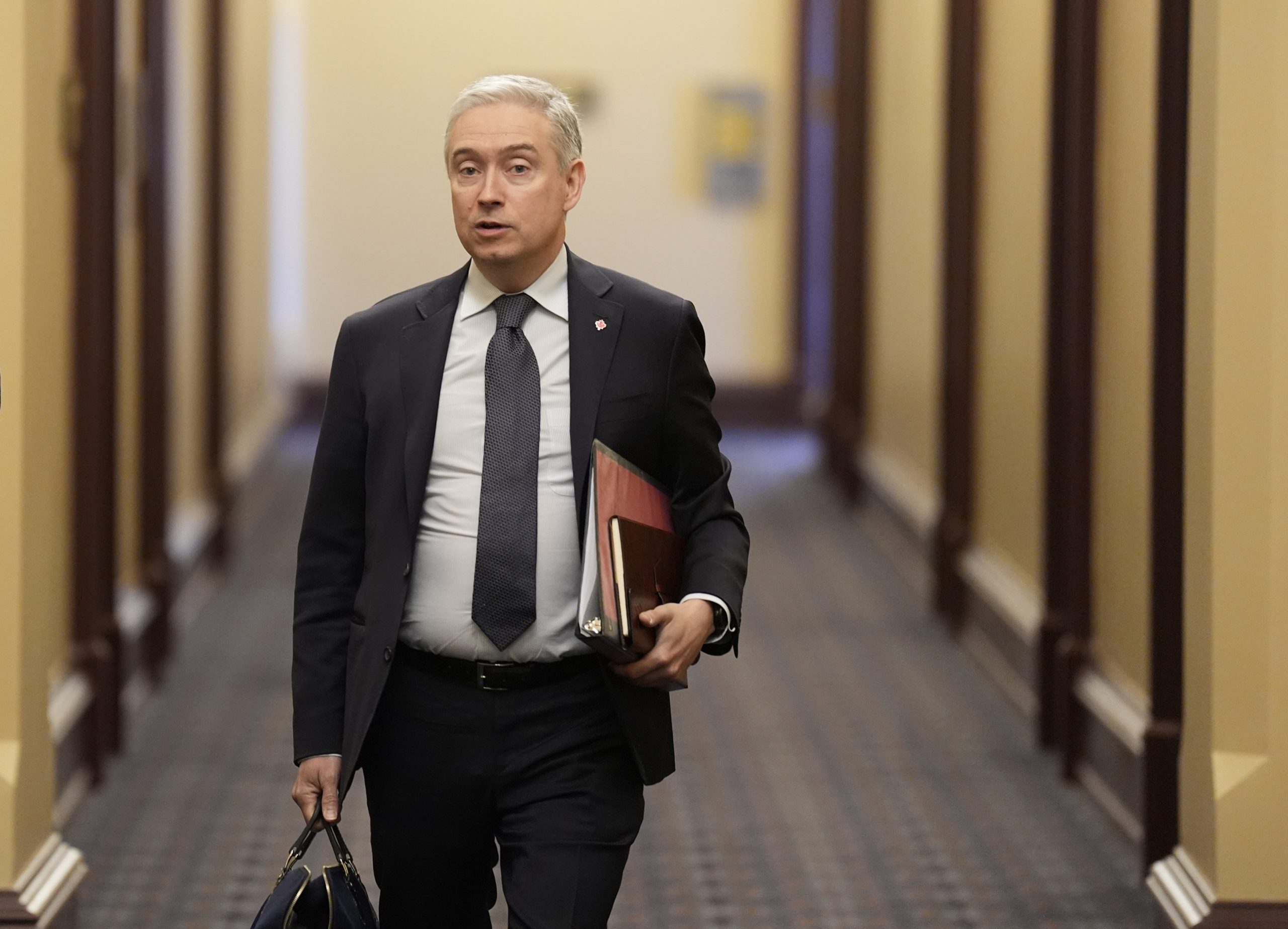 iPoliticsCA's tweet card. The report, written by senior economist with the Canadian Centre for Policy Alternatives David Macdonald, says the federal public service could lose up to 57,000 employees by 2028.