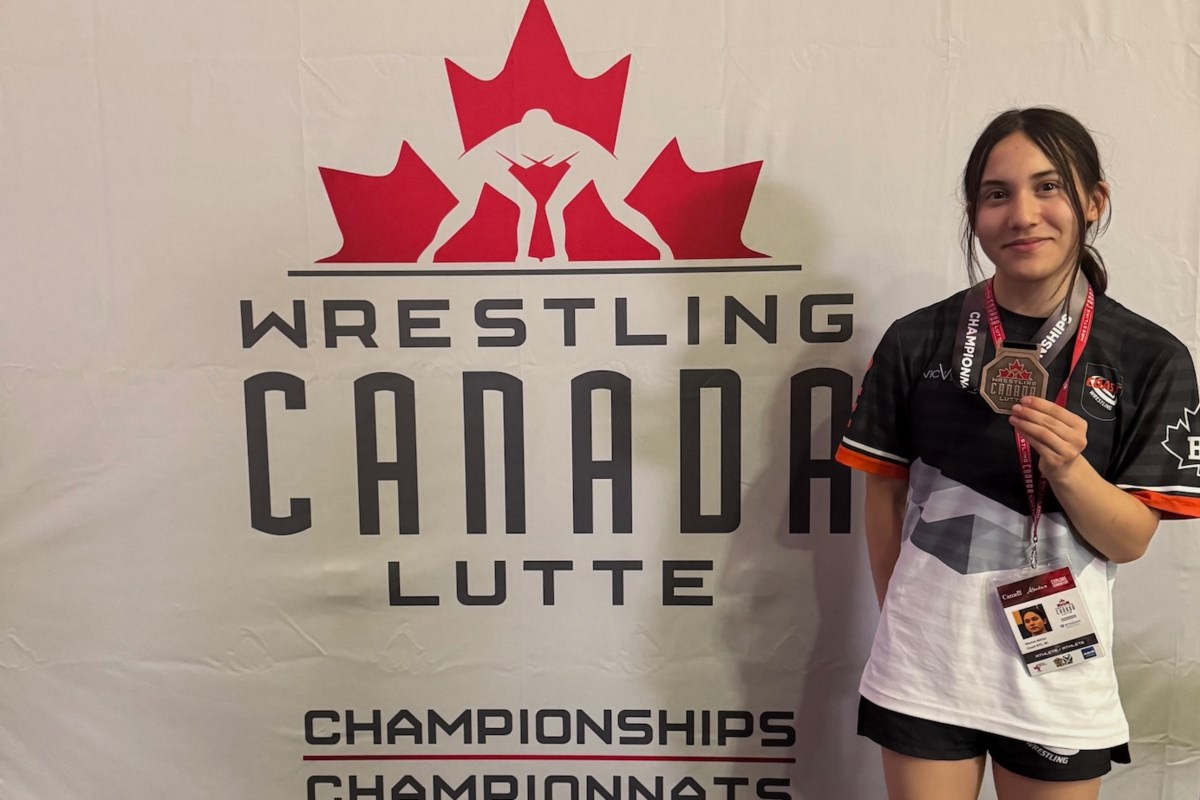 Thuncher's tweet card. The Squamish wrestler's coach, Frank Mensah, doesn't think 'any obstacle' will halt her development