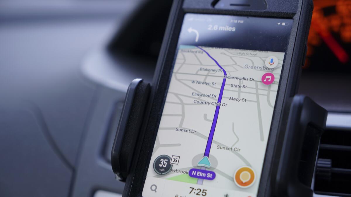 DavidMarkDC's tweet card. A California appeals court ruled this week that holding a phone while driving, even while looking at a map to navigate, is still illegal.