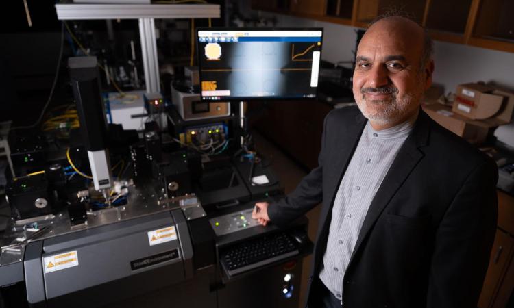 GeorgiaTech_ECE's tweet card. DARPA is backing Professor Ali Adibi’s work to use light, not electricity, to move data faster and more efficiently in next-generation electronics. 