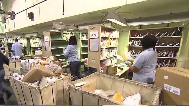APWUnational's tweet card. The American Postal Workers Union in Iowa is raising concerns about the potential privatization of the U.S. Postal Service, highlighted in a new TV ad targeting a Wells Fargo Equity Research document.
