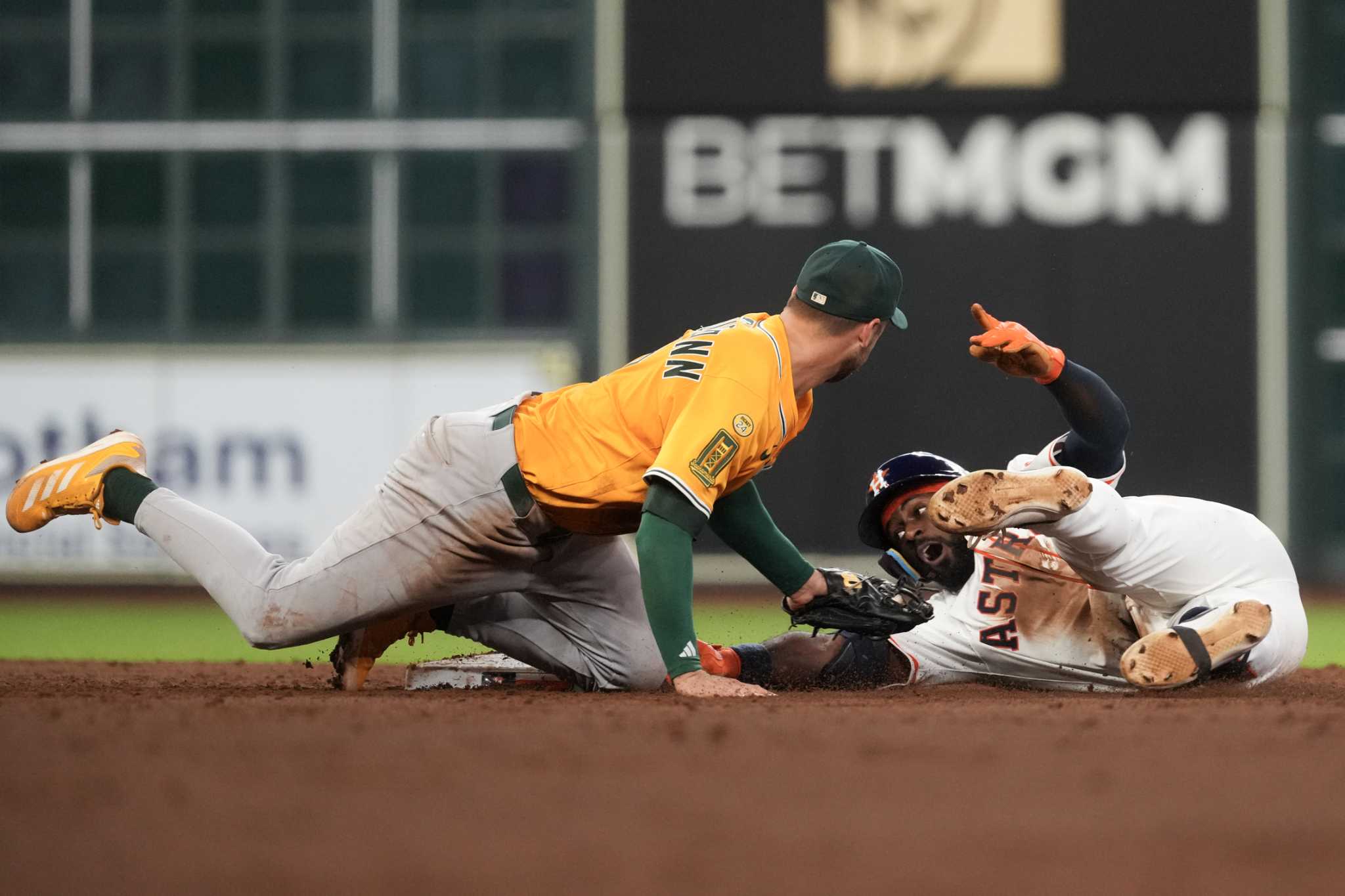 Chron_MattYoung's tweet card. Astros' 4-game win streak snapped by A's with uncharacteristically sloppy play