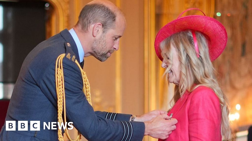 ChrisNowinski1's tweet card. Dawn Astle says she had "the most wonderful time" at an investiture ceremony on Wednesday.