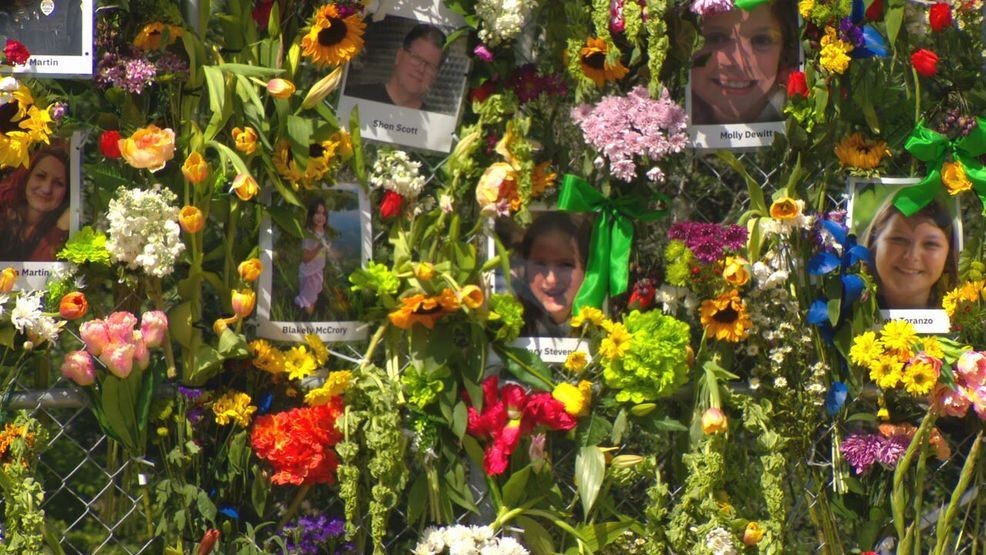 Jonathan_TVNews's tweet card. A large memorial is growing on Water Street in Kerrville with flowers and photos of each of the victims from Friday’s tragic flooding.