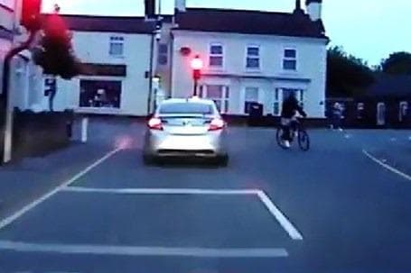 standardgemma's tweet card. He drove through a red light, narrowly missed a cyclist and a lamp post, and “swerved violently towards a row of shops”