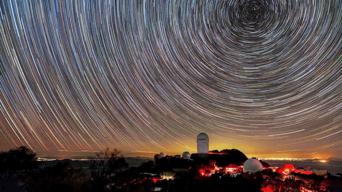 CosmosMagazine's tweet card. This week both the Dark Energy Survey and DESI released massive datasets which are challenging cosmologists’ best theories of the universe.