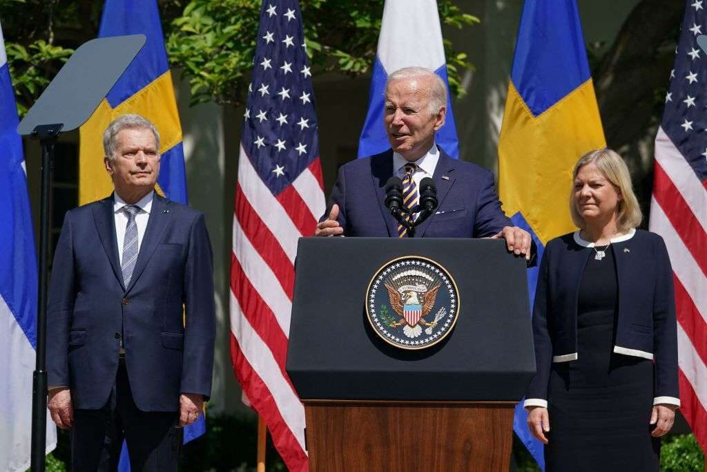 PaulCogan's tweet card. President Biden stood beside his Swedish and Finnish counterparts to support them joining NATO, in defiance of Vladimir Putin and Russia.