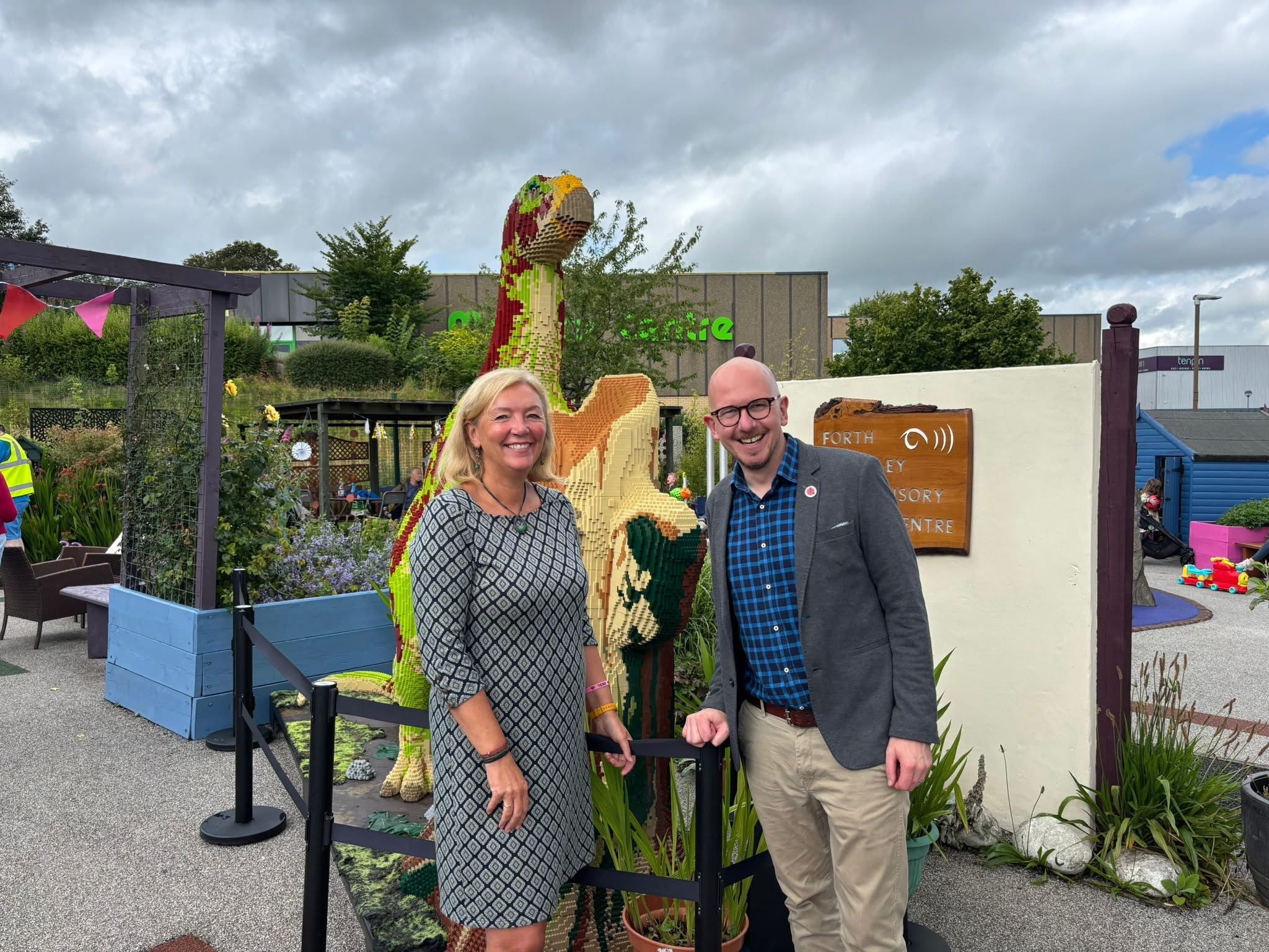 alloatiser's tweet card. A towering dinosaur and a soaking-wet ‘sponge splat’ game helped to raise nearly £2,000 for a sensory loss charity.