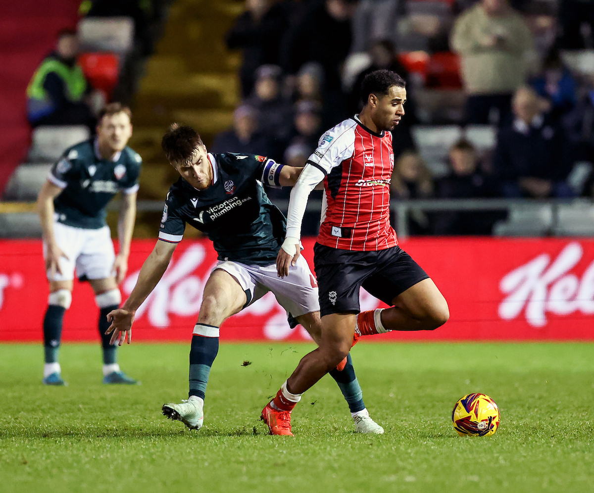 MarcIles's tweet card. Bolton Wanderers appear to have beaten off stiff competition from Championship clubs to sign Lincoln City's Ethan Erhahon.