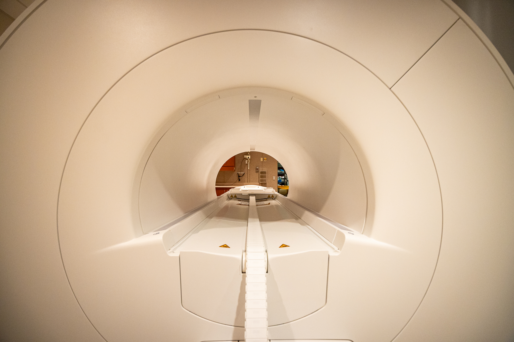 UofUResearch's tweet card. The scanner also supports green energy solutions for the University by reducing the use of coolant and helium from over 1,000 liters to 0.7 liters.