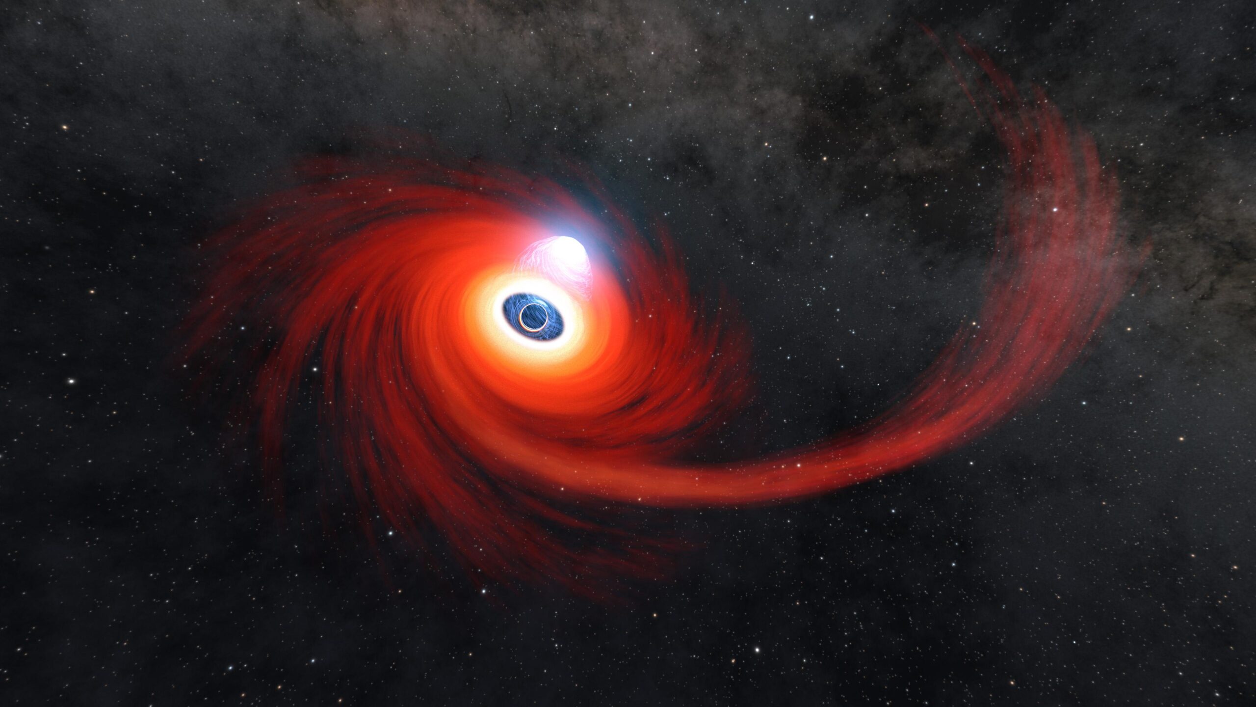 AASNova's tweet card. A recently discovered tidal disruption event has astronomers investigating new ways in which stars may be ripped apart by supermassive black holes.