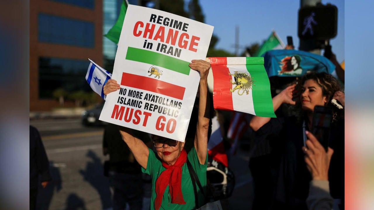 AlexWinston89's tweet card. The assumption that bombing Iran's strategic infrastructure would immediately trigger a popular revolt shows a fundamental misunderstanding of how people behave under siege.